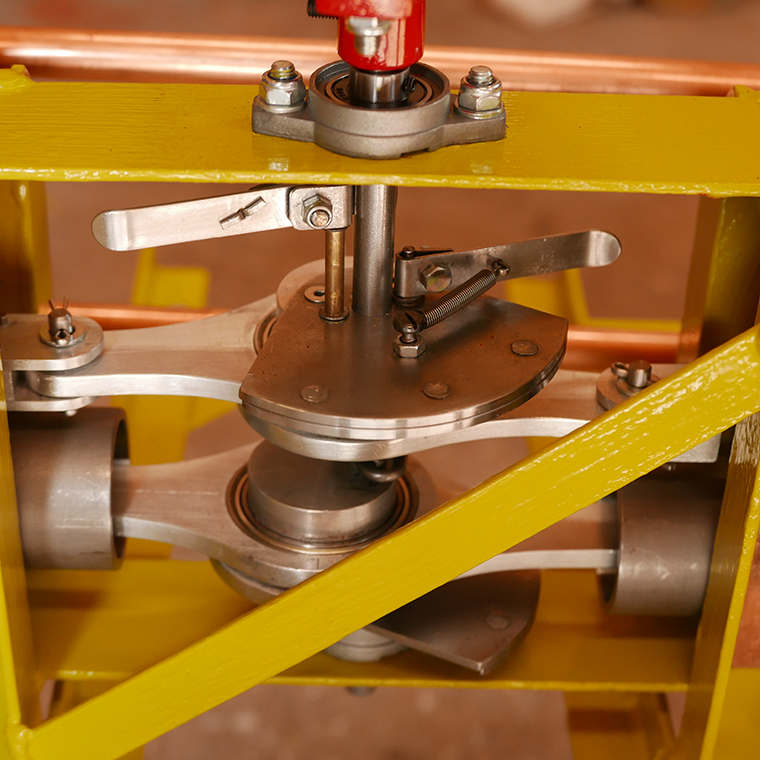 Crankshaft with eccentric and pawls